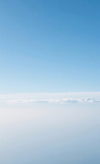 Aerial View of a Clear Blue Sky with Wispy Clouds A Serene and Peaceful Atmosphere