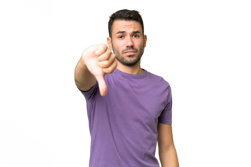 Young handsome caucasian man over isolated background showing thumb down with negative expression