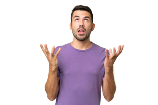 Young handsome caucasian man over isolated background stressed overwhelmed