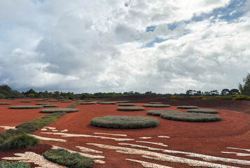 Desert sand gardens entrance and weather clouds