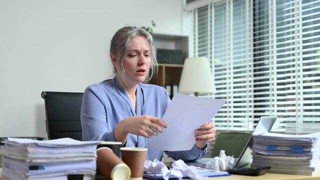 Overworked Businesswoman Under Stress Office Burnout, Paperwork Pressure, Deadlines, and Mental Health Challenges in a Busy Workplace Environment