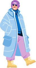 Smiling person wearing winter clothes and walking outdoors