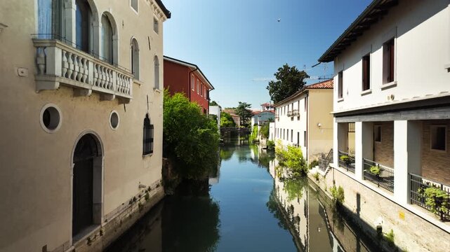 Lemene River through the historic center of Portogruaro, Italy
