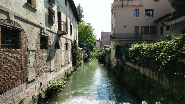 Lemene River through the historic center of Portogruaro, Italy