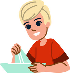 Blond boy making origami with paper and smiling