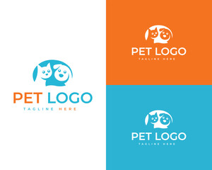 Cute dog and cat faces peeking out from a circular shape in blue and orange color variations animal logo