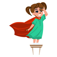 Young girl wearing superhero cape and looking far away