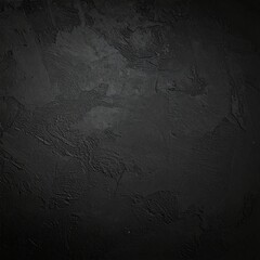 Naklejka premium an abstract image of a textured black wall. The image showcases a dark, rough surface with shadows and an uneven texture