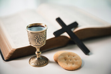 Christianity, holy communion ceremony is sacred act of worship and faith, where bread and wine in...