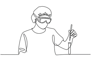 Scientist in protective gear holding a pipette