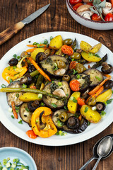 Roasted hot vegetables on a plate.