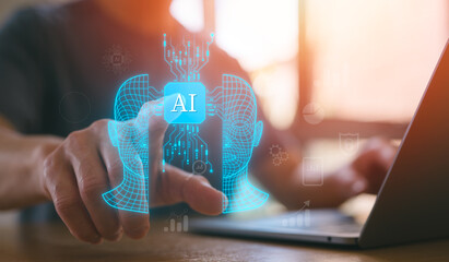 Businessman touching virtual AI icon with futuristic digital interface on laptop, representing artificial intelligence, machine learning, and innovative technology concepts.