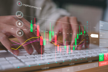 Hands typing on keyboard with trading chart in concept of market analysis financial and investment
