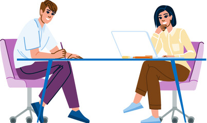 Office workers collaborating on project at desk, using laptop and taking notes