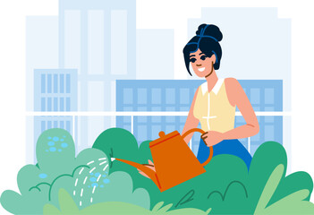 Woman watering plants in rooftop garden with city view