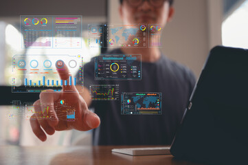 investment financial concept Business finance data analytics graph.Financial management technology.Advisor using KPI Dashboard on virtual screen, man using computer laptop working with data charts