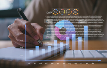 Close-up of hand writing on notebook with futuristic data analytics overlay including bar charts,...