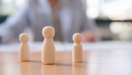Individuality and Leadership Concept with One Wooden Figure Standing Out