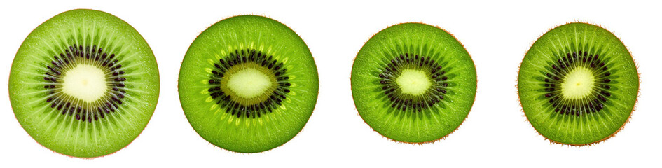 Sliced kiwi fruits on a black backdrop, top view