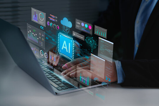 Artificial intelligence technology with businessman using laptop showing AI chip symbol and digital data analytics interface for automation, innovation, and business intelligence