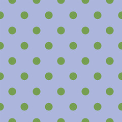 Seamless vector pattern with green polka dots on a lavender background. Great for spring-inspired projects, stationery, and textile prints.