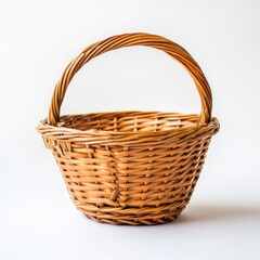 Empty light brown wicker basket with a curved handle (1)
