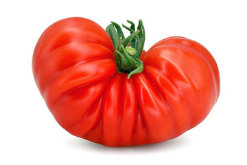 ribbed ripe beefsteak tomato isolated on white background, single fresh wrinkled tomato variety