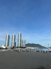 Scenic Beach View with Modern Buildings