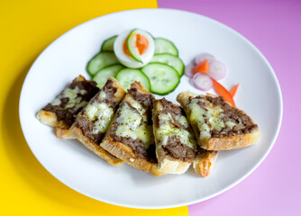 Close Up of Grass Fed British Minced Beef Sourdough Sandwiches with Welsh Cheddar Cheese, Egg, Organic Cucumber and Shallots Art Flower