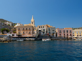 Harbour view of Lipari, Aeolian Islands, Italy. Sunny day, calm sea, blue sky, old italian white,...
