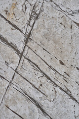 Detailed Close Up Texture Of Natural Stone Surface With Linear Markings And Grain Variations