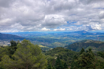 Panoramic view on Yunquera and surrunding pine forest from Puerto Saucillo viewpoint, Sierra de las Nieves national park, Andalusia, Spain