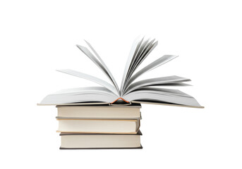 Perfectly composed stack of four plain hardcover books in muted tones, top one open with fanned blank pages, on an immaculate bright white studio background, concept of knowledge and learning