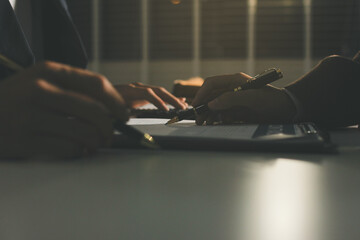 Lawyer explained to the client about the law that must be brought against the court case.