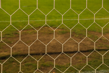 Close-Up of Soccer Net Detail &ndash; Football and Sports Concept on Green Grass