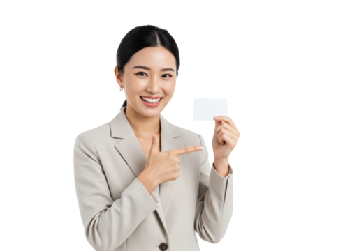 A young woman, mid-20s, in a light blazer, holding a credit card and pointing, smiling radiantly against a transparent studio background with copy space, financial empowerment concept