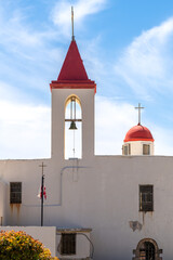 The red roofed towers of Saint John's Baptist Church in the old city of Acre, Akko Israel.
