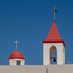 The red roofed towers of Saint John's Baptist Church in the old city of Acre, Akko Israel.
