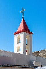 The red roofed towers of Saint John's Baptist Church in the old city of Acre, Akko Israel.

