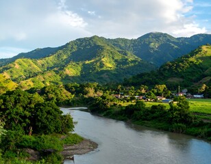 Obraz premium Lush valley with river winding through mountains
