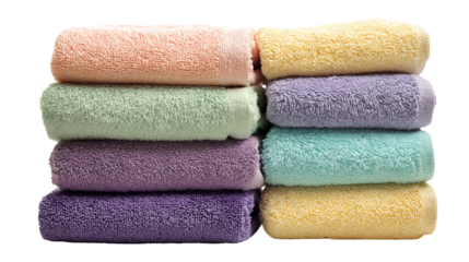 stack of neatly folded pastel towels, isolated on white background, household stock photo