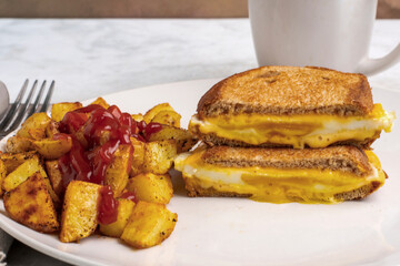 egg melt sandwich with home fries