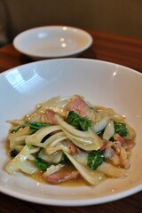 Chinese cuisine: stir-fried Cantonese bok choy and bacon
