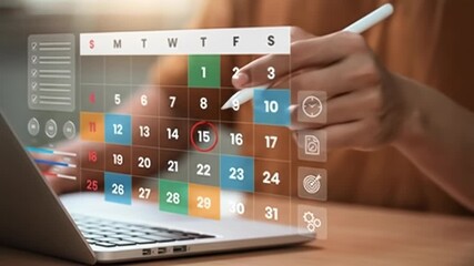 Person using a laptop with an interactive calendar overlay - Powered by Adobe