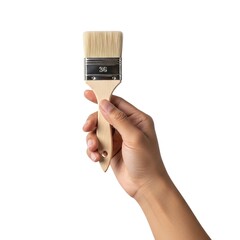 Hand holding a paint brush isolated on white background 
