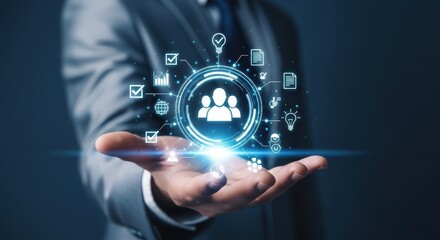 Hand displaying a glowing digital interface with people icons and business symbols, symbolizing human resources and team management
