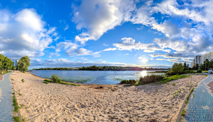 Spring aerial panoramic view on sand beach Dnieper River in Kyiv, Ukraine. Blue beautiful cloud sky...
