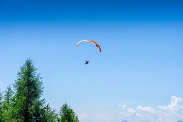Paraglider over the Hirzer Alm in South Tyrol