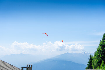 Paraglider over the Hirzer Alm in South Tyrol