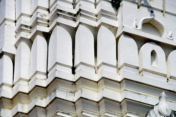 Intricate Architectural Details of a White Historical Structure